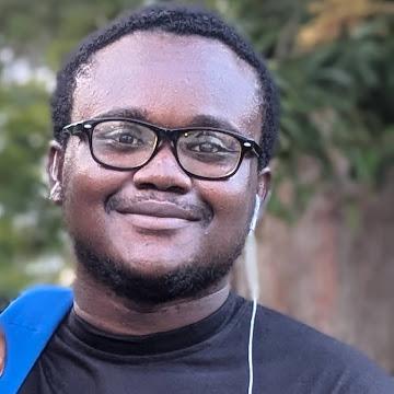 A smiling photo of Johanan.